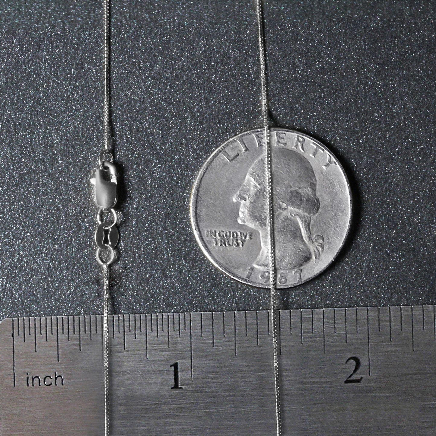 Peelerie jewelry piece in midnight luxury editorial product photo, high-contrast studio lighting