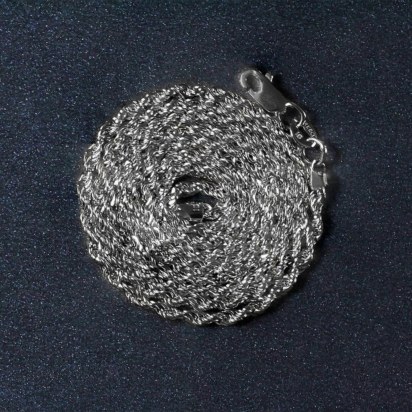 Peelerie jewelry piece in midnight luxury editorial product photo, high-contrast studio lighting