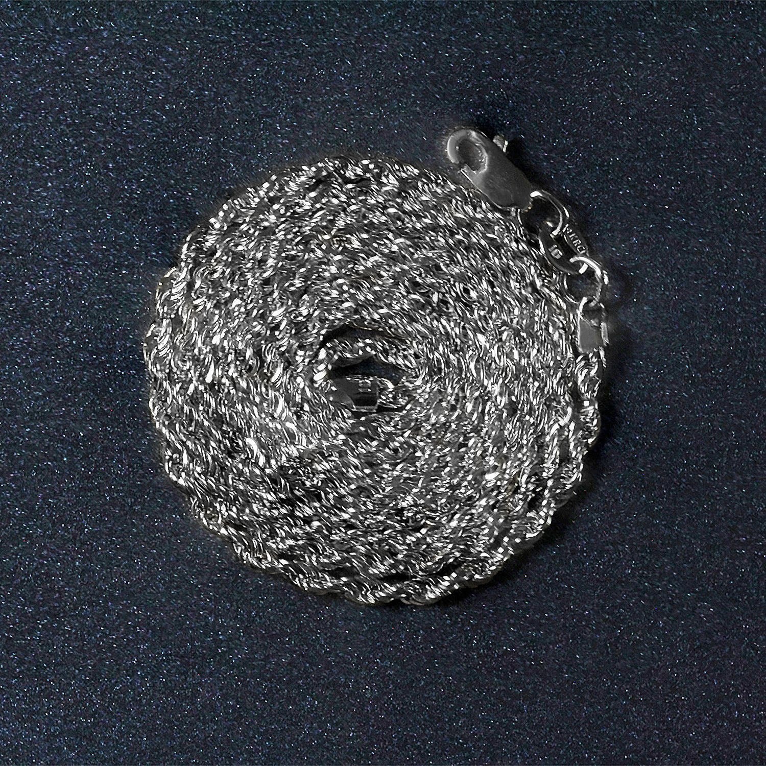 Peelerie jewelry piece in midnight luxury editorial product photo, high-contrast studio lighting