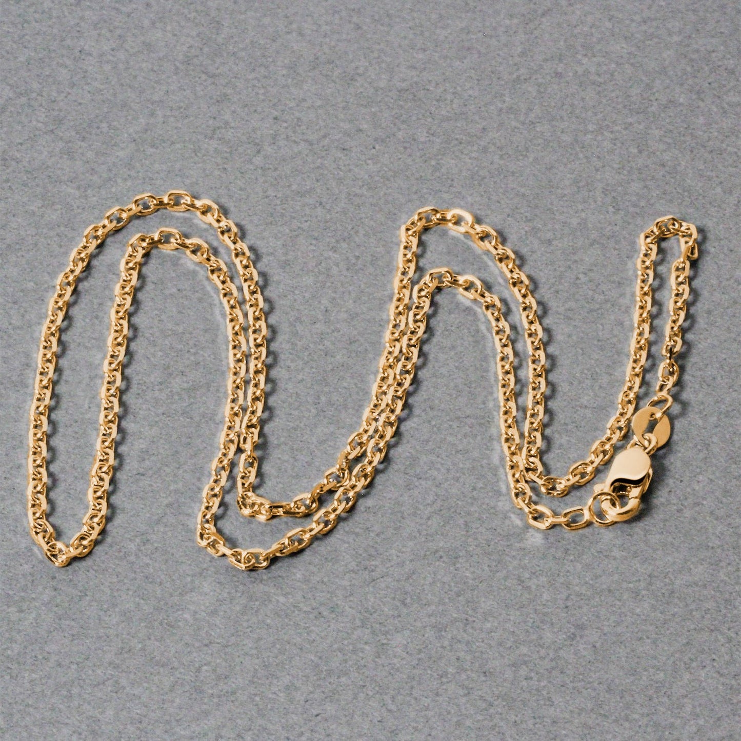 Peelerie jewelry piece in midnight luxury editorial product photo, high-contrast studio lighting