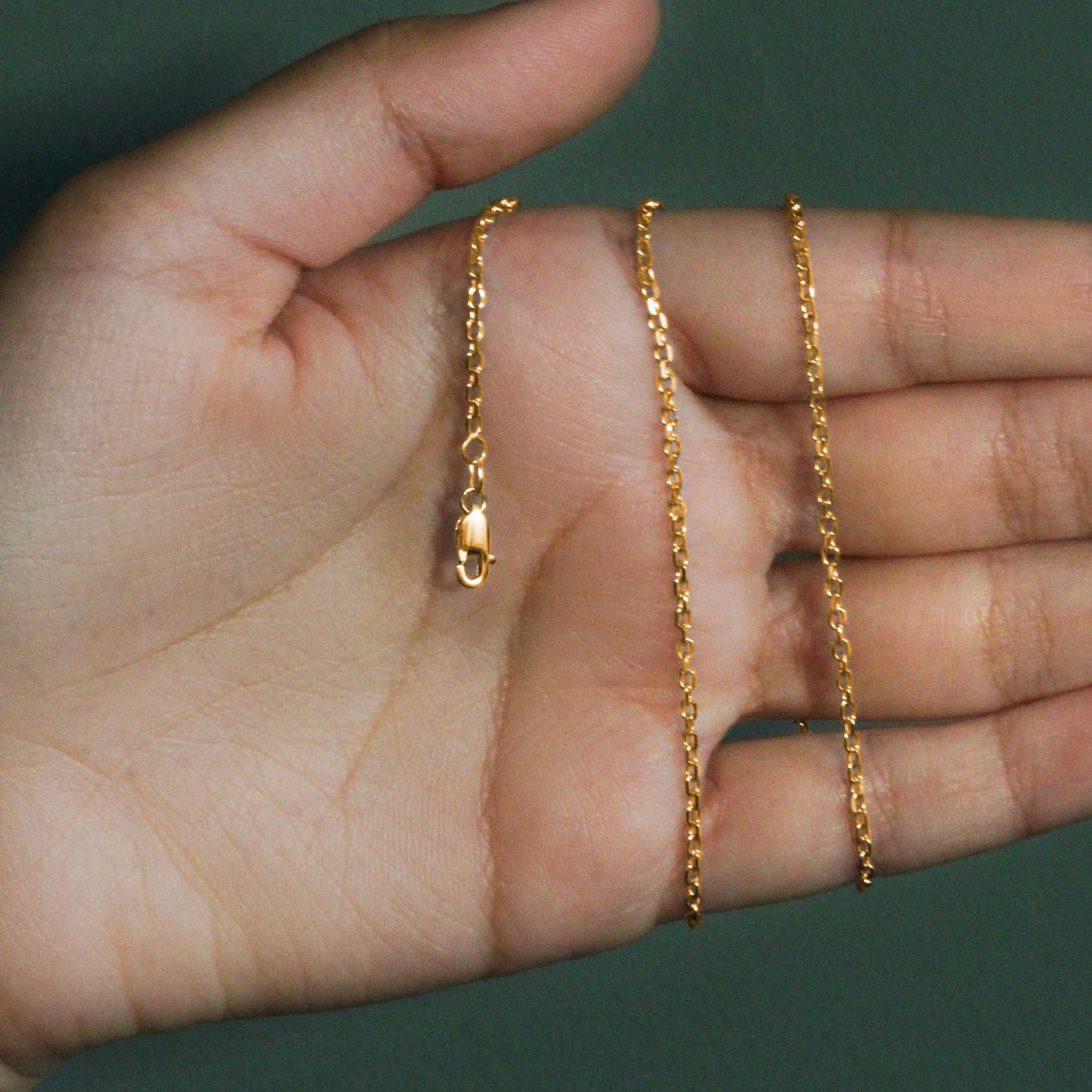 Peelerie jewelry piece in midnight luxury editorial product photo, high-contrast studio lighting