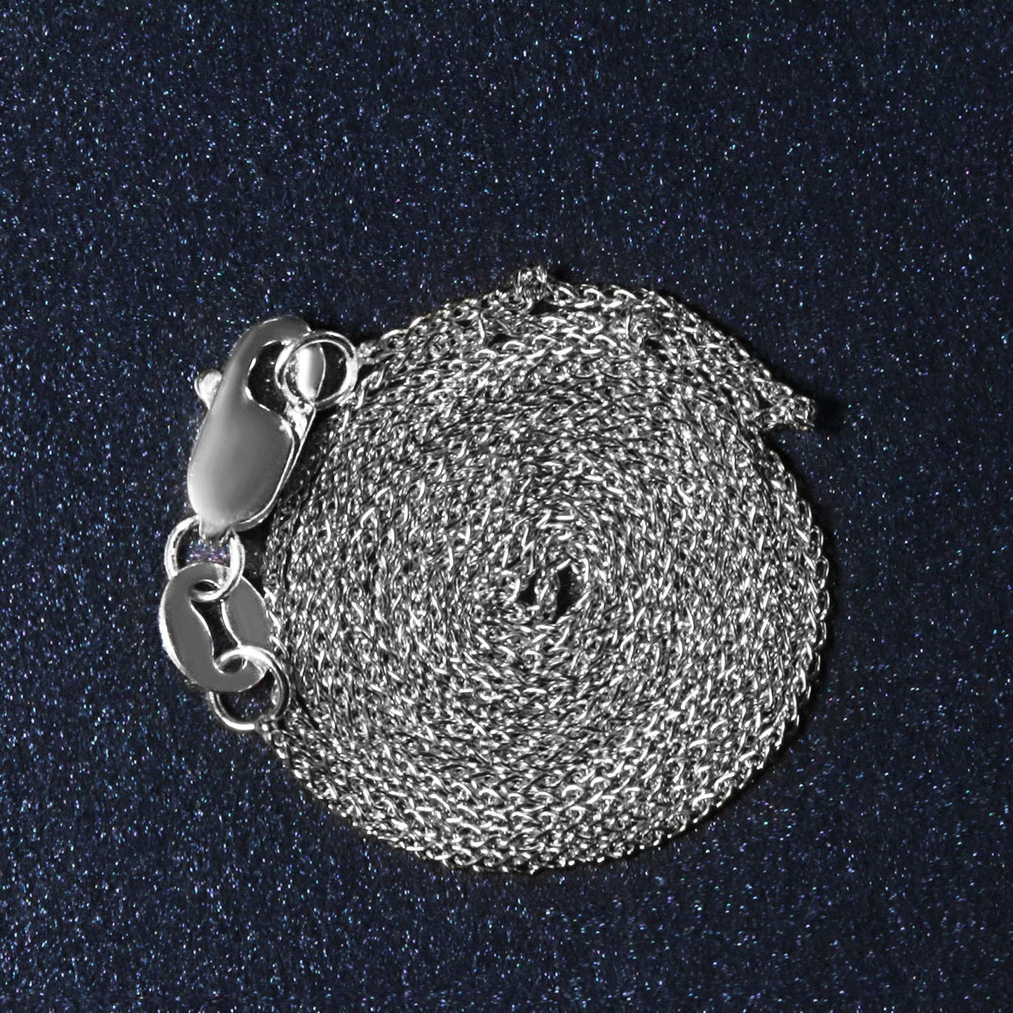 Peelerie jewelry piece in midnight luxury editorial product photo, high-contrast studio lighting