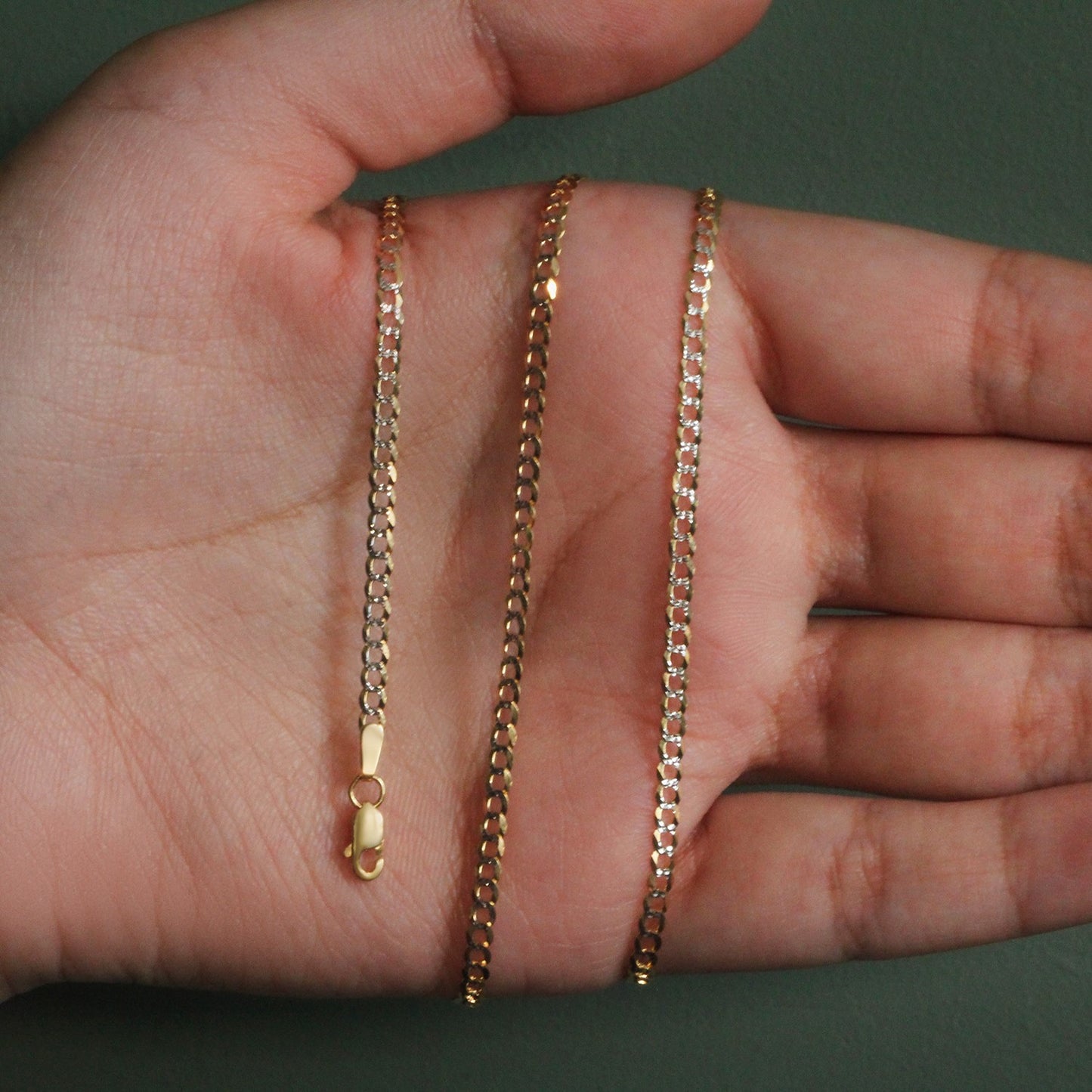 Peelerie jewelry piece in midnight luxury editorial product photo, high-contrast studio lighting