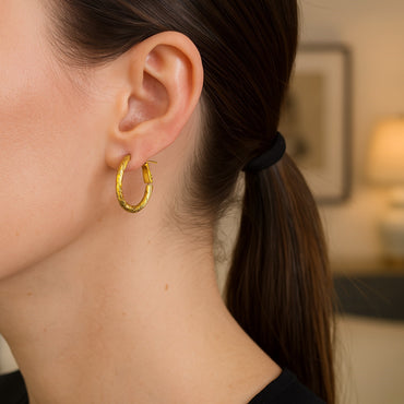 Peelerie jewelry piece in midnight luxury editorial product photo, high-contrast studio lighting