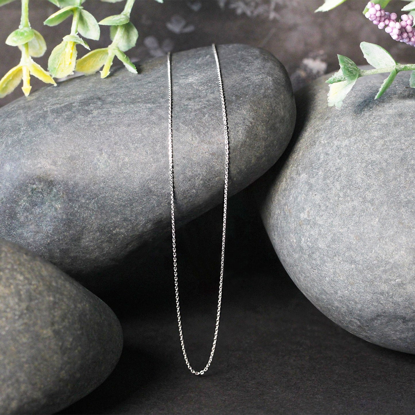 Peelerie jewelry piece in midnight luxury editorial product photo, high-contrast studio lighting