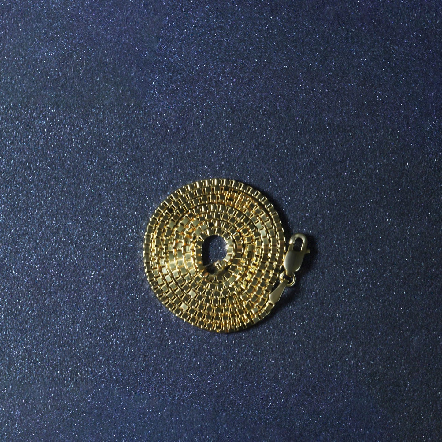 Peelerie jewelry piece in midnight luxury editorial product photo, high-contrast studio lighting