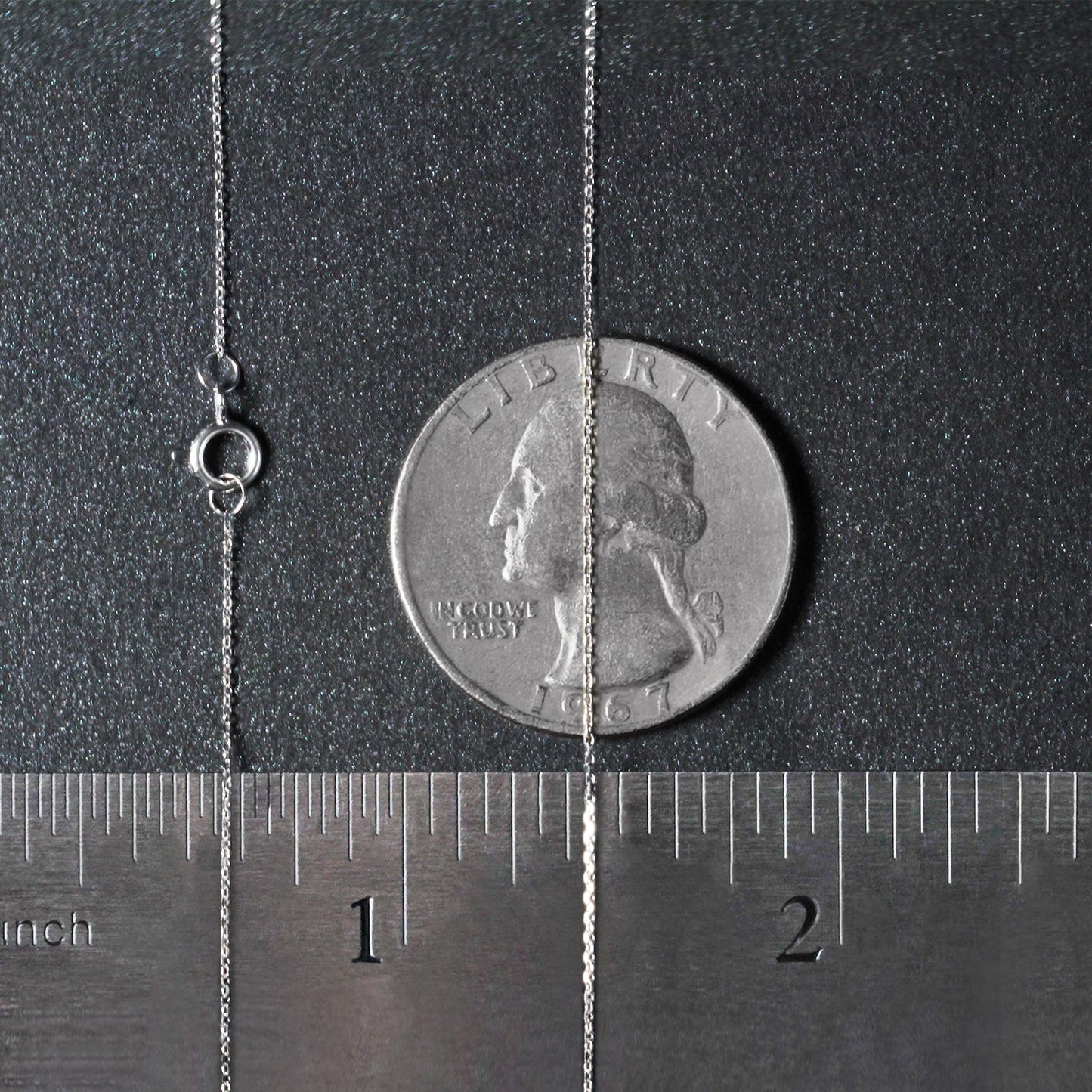 Peelerie jewelry piece in midnight luxury editorial product photo, high-contrast studio lighting