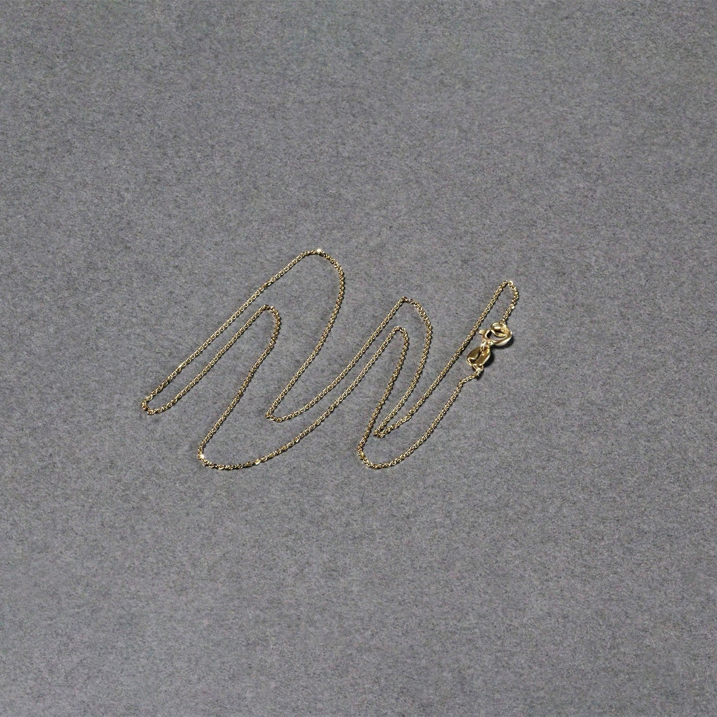 Peelerie jewelry piece in midnight luxury editorial product photo, high-contrast studio lighting