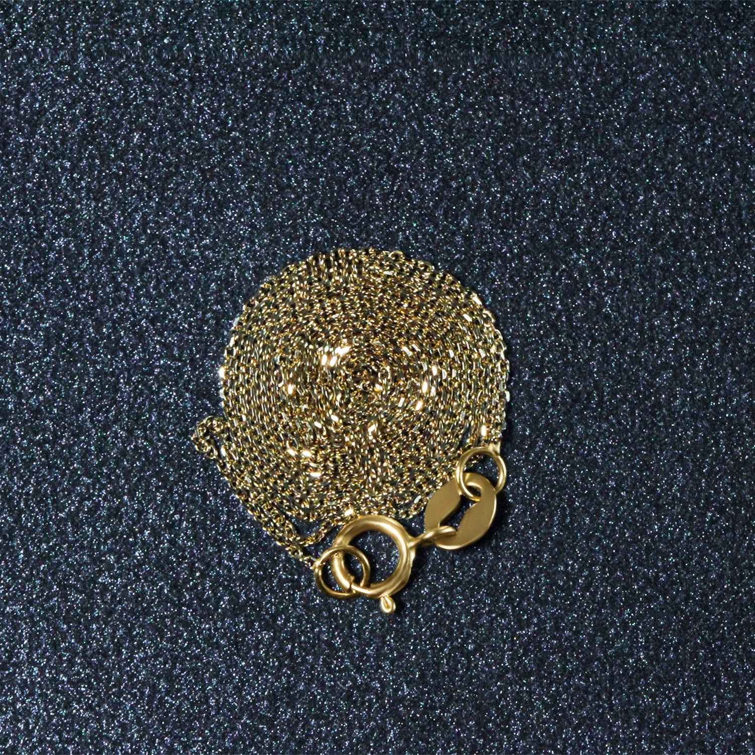 Peelerie jewelry piece in midnight luxury editorial product photo, high-contrast studio lighting