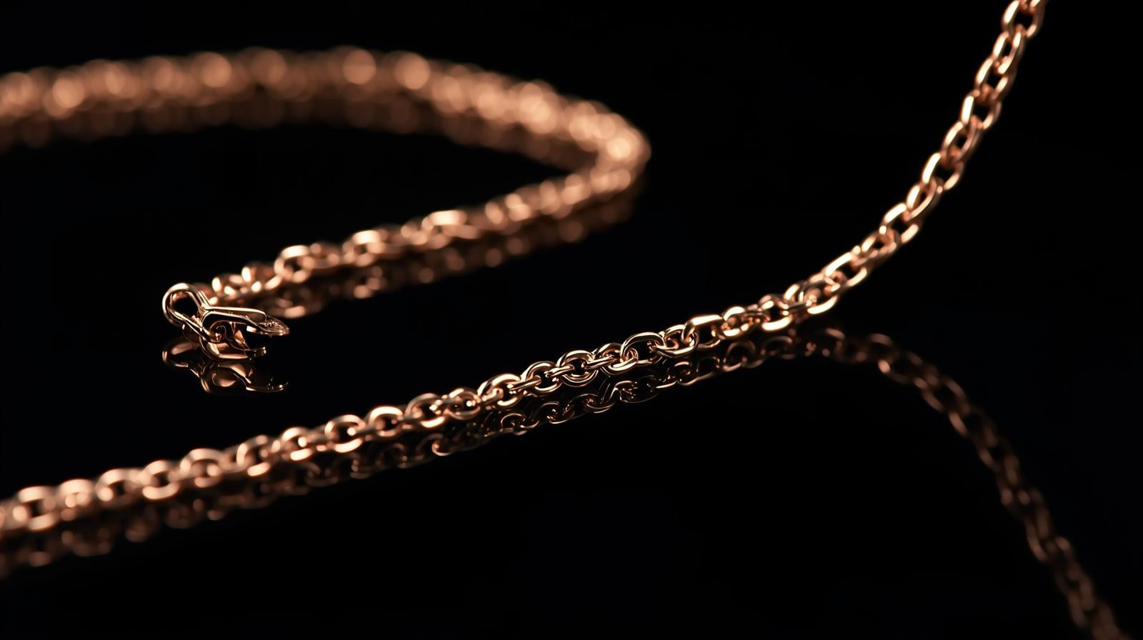 Gold chain on a black background