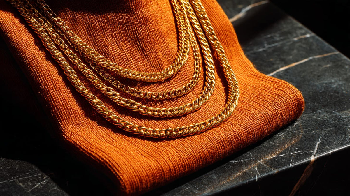 stacked of solid gold cuban chain in 14k - peelerie