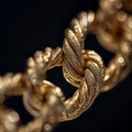 masbatenyc_close-up_of_textured_gold_chain_under_studio_light_e4655053-8578-41b5-b5c3-5b7997a2e334_1 - Peelerie