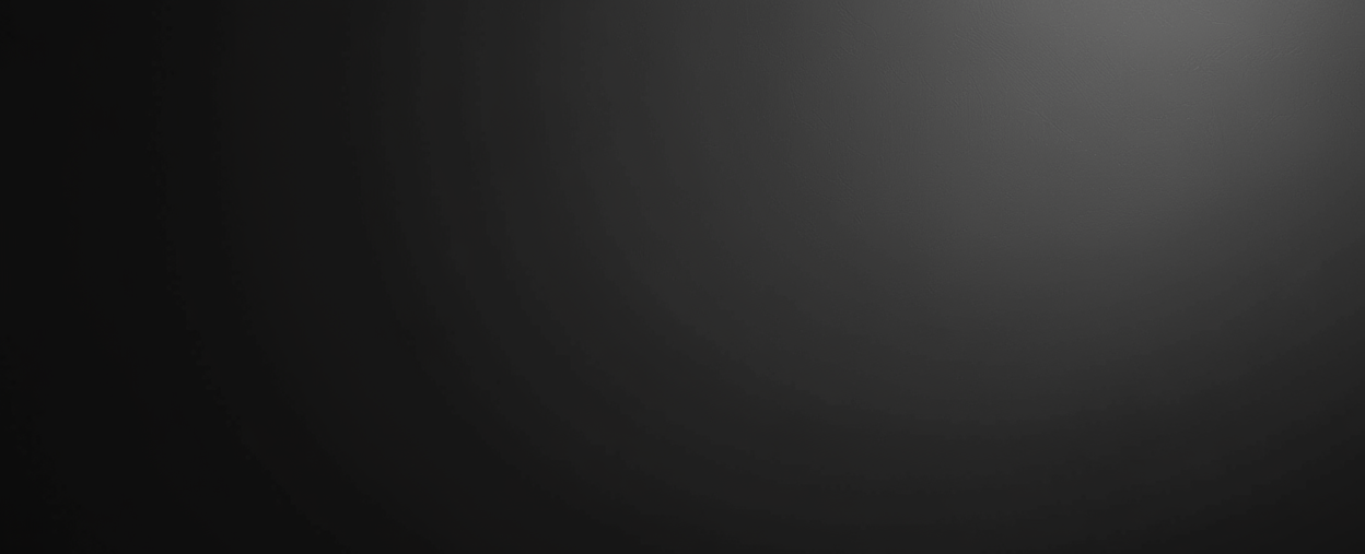 Black oval object on a dark background