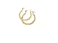 Boucles d'oreilles créoles en or jaune 10 carats motif branche
