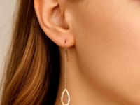 Boucles d'oreilles pendantes longues texturées en forme de poire en or rose 14 carats
