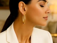 Créoles ovales allongées en or jaune 14 carats