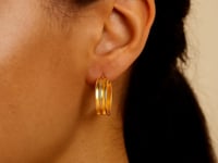 Grandes boucles d'oreilles créoles concaves en or jaune 14 carats