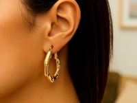 Boucles d'oreilles créoles moyennes en bambou en or jaune 14 carats