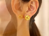Puces d'oreilles nœud d'amour en or jaune 14 carats