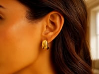 Boucles d'oreilles créoles bombées en or jaune 14 carats