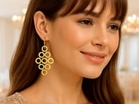 Boucles d'oreilles en or jaune 14 carats avec motifs de cercles ouverts texturés