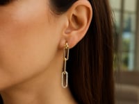 Boucles d'oreilles pendantes en chaîne trombone en or jaune 14 carats avec diamants