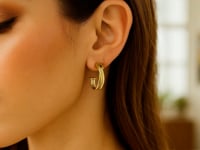 Créoles croisées en or jaune 14 carats
