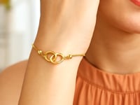 Bracelet de style lariat réglable avec anneaux entrelacés en or jaune 14 carats