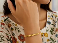 Bracelet à perles taillées diamant en or jaune 14 carats