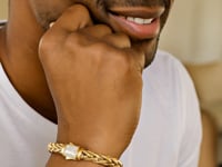 Bracelet corde tressée avec fermoir accentué de diamants en or jaune 14 carats