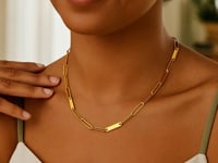 Collier en or jaune 14 carats à maillons alternés maille trombone et barrette