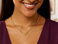 Collier chaîne Figaro en or jaune 14 carats avec cœur