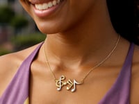 Collier notes de musique en or bicolore 14 carats jaune et blanc