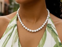 Collier de perles avec fermoir boule en or jaune 14 carats