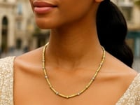 Collier barre et perles bicolore en or 14 carats