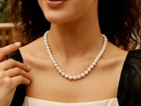Collier de perles avec fermoir boule en or jaune 14 carats