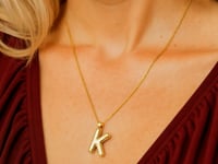 Pendentif lettre K en or jaune 14 carats Helium