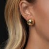 Diamond-cut earrings in solid 14K yellow gold, view 4