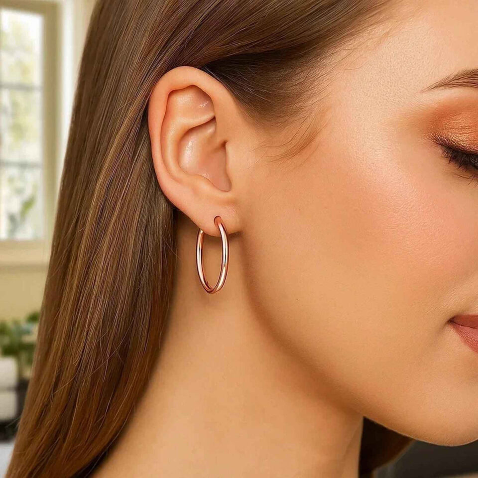 3x25mm polished hoop earrings in solid 14K rose gold, view 4