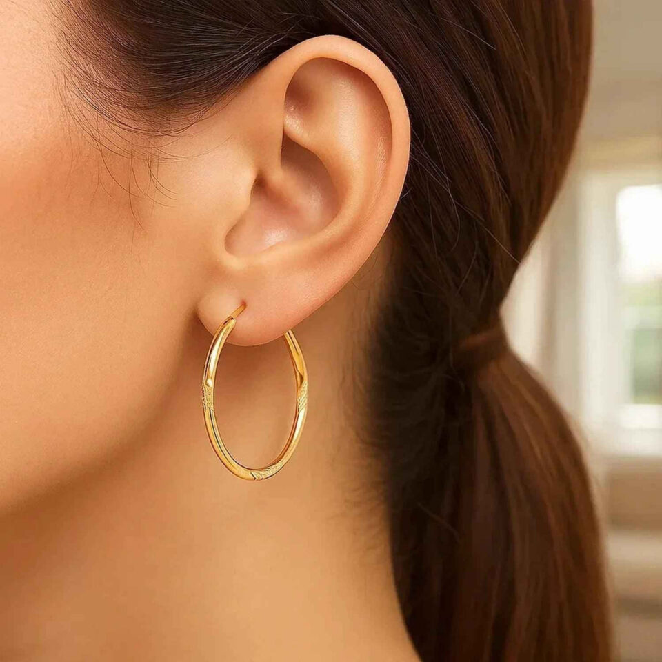 2 × 30 mm diamond-cut slender large hoop earrings in solid 14K yellow gold, view 2