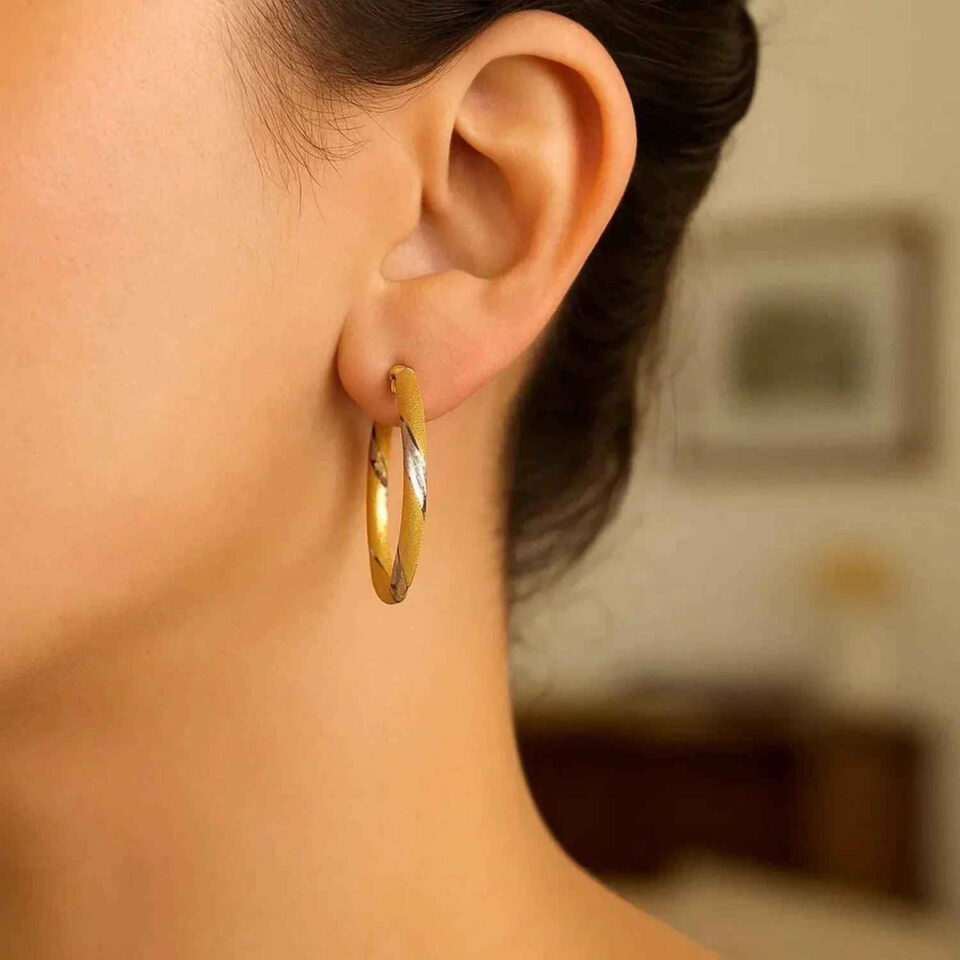 3x30mm polished hoop earrings in solid 14K two-tone gold, view 3