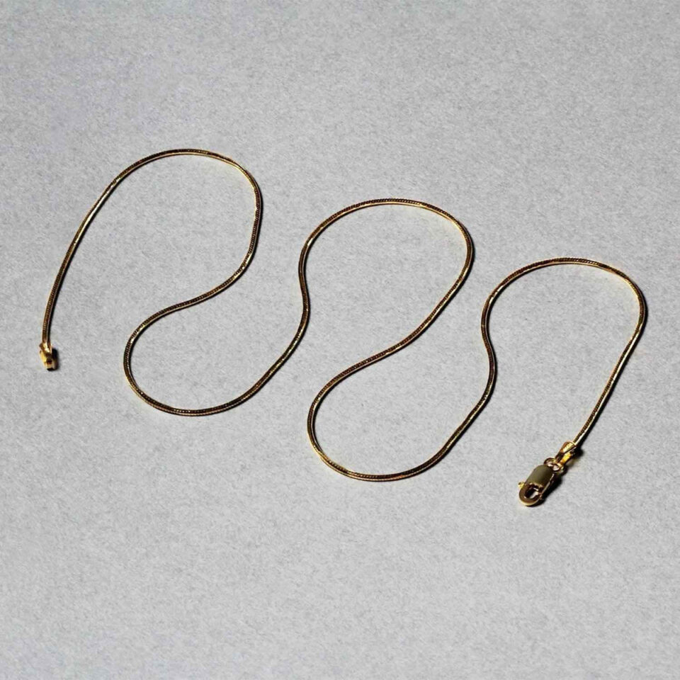 0.90mm snake round chain in solid 14K yellow gold, view 5