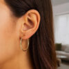 1.5x30mm polished hoop earrings in solid 14K yellow gold, view 3