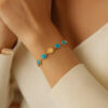 Turquoise bracelet in solid 14K yellow gold, view 2