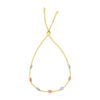 Oval textured bracelet in solid 14K tri-colour gold