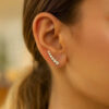 Graduated cubic zirconia earrings in solid 14K yellow gold, view 3