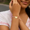 9 1/4 inch pink cord adjustable heart bracelet in solid 14K yellow gold, view 4