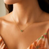 Round peridot necklace in solid 14K yellow gold, view 3