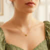 Round peridot necklace in solid 14K yellow gold, view 6