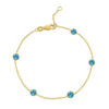 Blue topaz station bracelet in solid 14K yellow gold